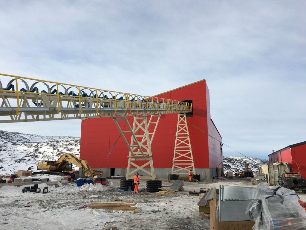 Exterior of process plant building showing the primary ore conveyor installation