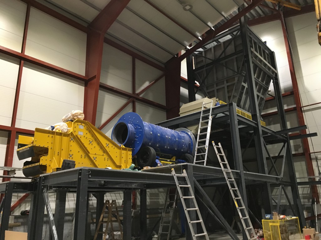 Tower #1 with primary ore feed hopper, rotational scrubber and vibrating screens